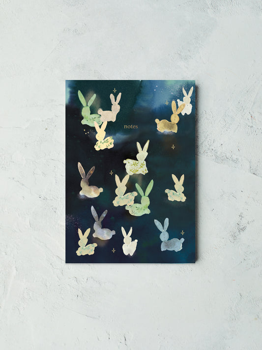Midnight rabbits lined recycled notebook